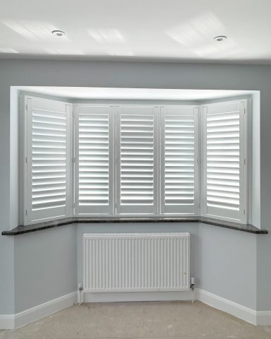 Shutters in bay with 63mm lourves in Bridgend. 63mm Composite shutters.